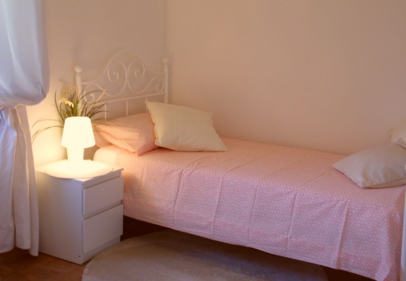 bedroom with twin beds by Lake Bolsena