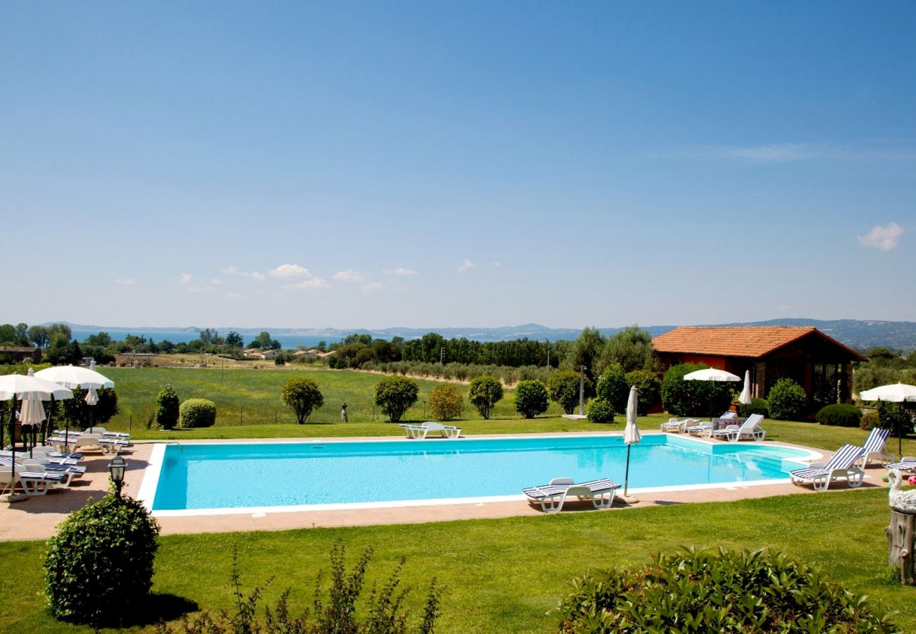 House in Bolsena - Casa Fenile - Holiday house with view on the Pool and beach